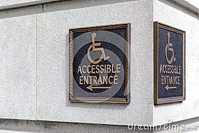 Sign pointer direction motion the wheelchair on the building cor Stock Photo