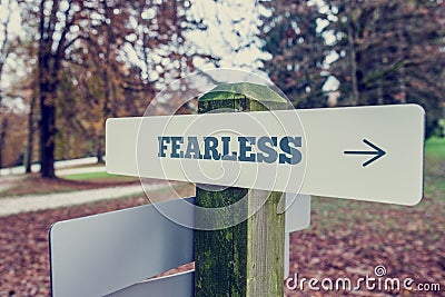 Sign Post Showing Direction to Fearlessness Stock Photo