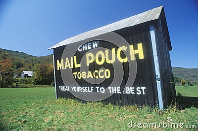 A sign that reads ï¿½Chew Mail Pouch Tobacco - Treat Yourself to the Bestï¿½ Editorial Stock Photo