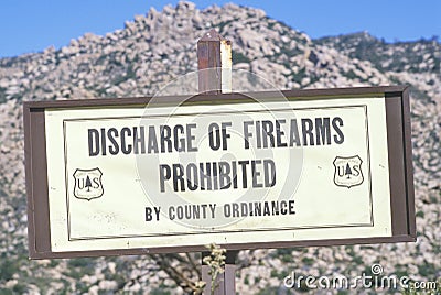 A sign that reads ï¿½Discharge of firearms prohibitedï¿½ Editorial Stock Photo