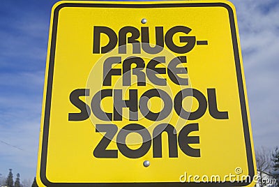 A sign that reads ï¿½Drug free school zoneï¿½ Stock Photo