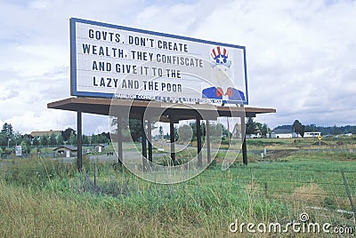 A sign that reads ï¿½Govts. Donï¿½t create wealth, they confiscate and give it to the lazy and the poorï¿½ Editorial Stock Photo