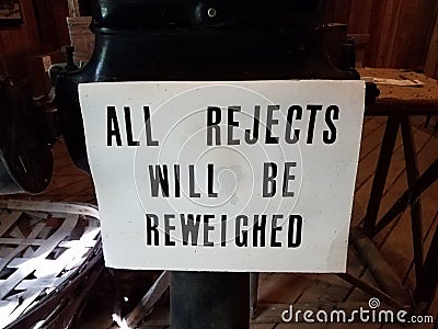 Sign saying all rejects will be reweighted Stock Photo