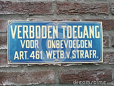 Sign saying in Dutch that access is not allowed for unauthorized people Stock Photo