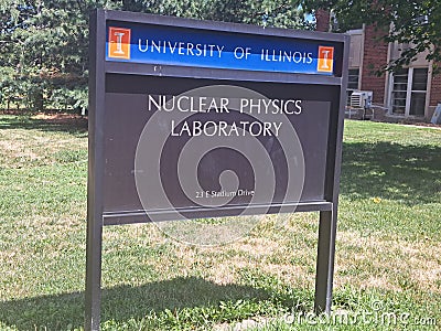 Sign Saying Nuclear Physics Laboratory in University of Illinois, Urbana Champaign, on a Grassy Lawn Editorial Stock Photo