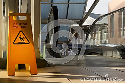 Sign showing warning of caution wet floor Stock Photo