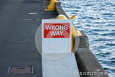 `WRONG WAY` Sign On City Wharf Stock Photo