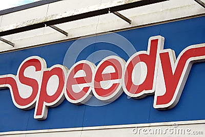Sign of the Speedy auto center in Vannes in Brittany Editorial Stock Photo