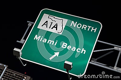 Sign to A1A north to Miami Beach lit at night Stock Photo