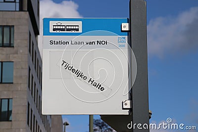 Sign for tram and bus stop at station Den Haag Laan van NOI as temporary stop. Editorial Stock Photo