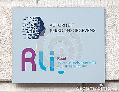 Sign at the wall of the office of the authority of personal data and the Council of living envrionment and infrastructure in The H Editorial Stock Photo