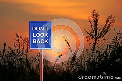 A sign warning a Don`t Look Back Stock Photo