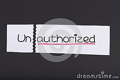 Sign with word unauthorized turned into authorized Stock Photo