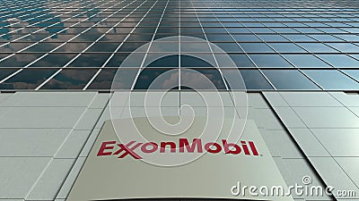 Signage board with ExxonMobil logo. Modern office building facade. Editorial 3D rendering Editorial Stock Photo