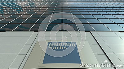 Signage board with The Goldman Sachs Group, Inc. logo. Modern office building facade. Editorial 3D rendering Editorial Stock Photo