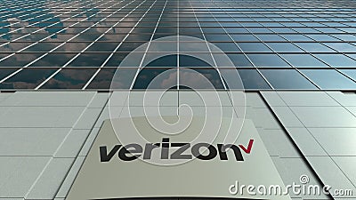 Signage board with Verizon Communications logo. Modern office building facade. Editorial 3D rendering Editorial Stock Photo