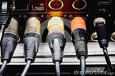 Signal cables on the back of the digital audio mixer Stock Photo