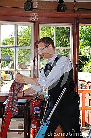 Signalman in signal box, Highley. Editorial Stock Photo