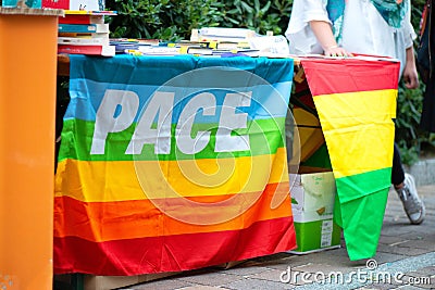 Signature collection table with rainbow peace flag Stock Photo