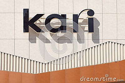 Signboard, name of store logo Kari on building of Planet shopping center. Perm, Russia Editorial Stock Photo