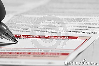 Signing credit agreement Stock Photo