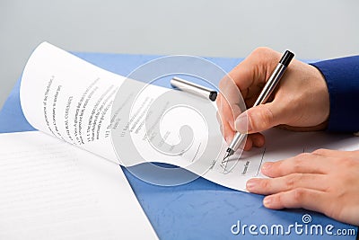Signing the document Stock Photo