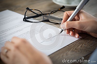 Signing a form Stock Photo