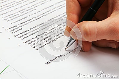 Signing a generic license agreement Stock Photo