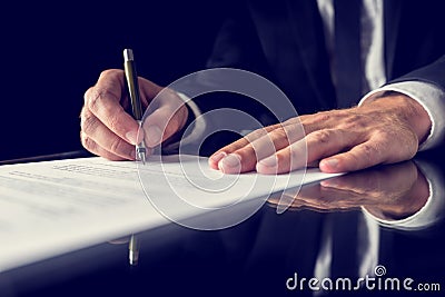 Signing legal document Stock Photo