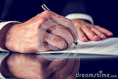 Signing mortgage papers Stock Photo