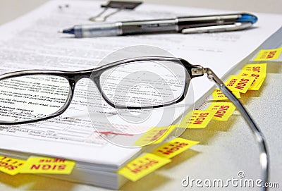 Signing real estate documents Stock Photo