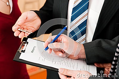 Signing tenant agreement Stock Photo