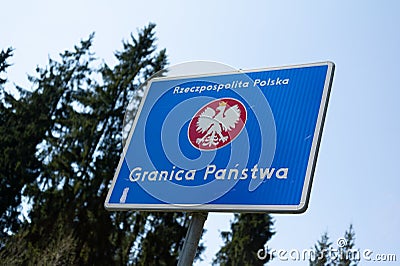 Signpost is demamarcating Poland and borderline. Stock Photo