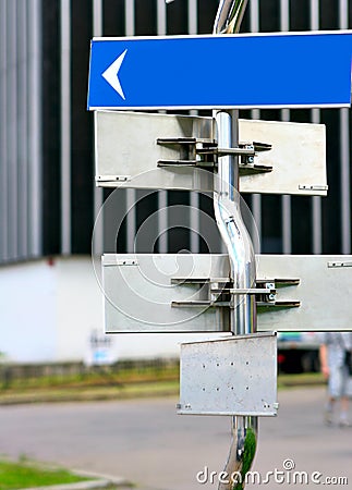 Signpost with direction arrows Stock Photo