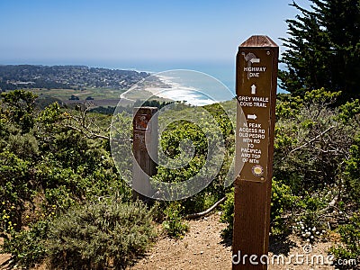 Signpost at junction of grey whale cove trail and old pedro mountain trail Editorial Stock Photo