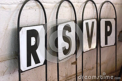 A signpost with letters spelling rsvp respondez s'il vous plait Stock Photo