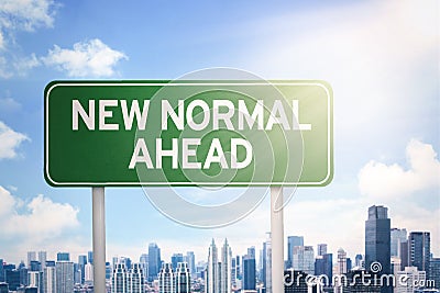 Signpost with New Normal Ahead text Stock Photo