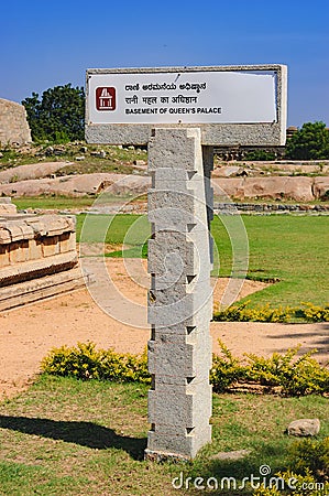 Signpost to Basement of Queen`s Palace in Hampi, India Stock Photo
