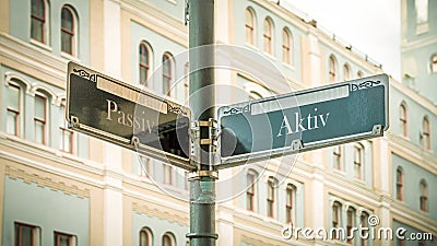 Signposts the direct way to Active versus Passive Stock Photo