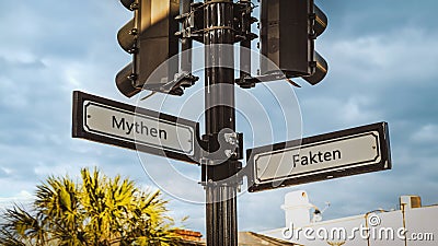 Signposts the direct way to Facts versus Myths Stock Photo