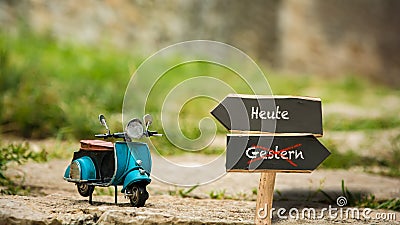 Signposts the direct way to today versus yesterday Stock Photo