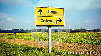 Signposts the direct way to today versus yesterday Stock Photo