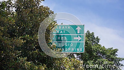 Signposts pointing to other cities Stock Photo