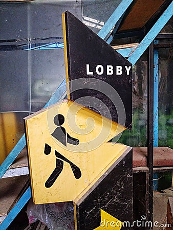signposts to the lobby, in black and yellow. Stock Photo