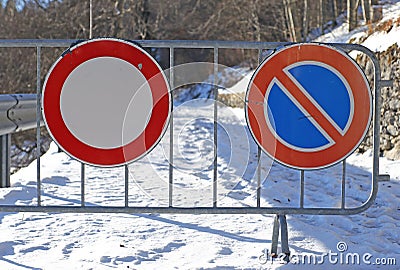 Signs of the road closed for the abundant snowfall Stock Photo