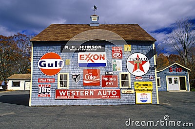 Signs on side of gas and service station Editorial Stock Photo