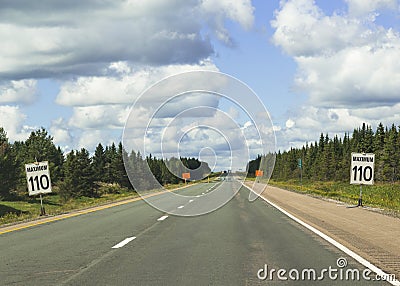 Signs Warning of Speed Limit of 110 in Nova Scotia Stock Photo