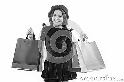 Signs you are addicted to shopping. Kid cute little girl hold bunch shopping bags. Child satisfied by shopping isolated Stock Photo