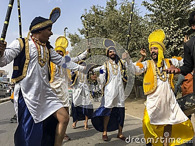 Sikh artists performing Bhangra dance Editorial Stock Photo