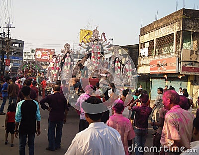 Celebratory procession marking the end of the annual festival of a Hindu Goddess in India Editorial Stock Photo